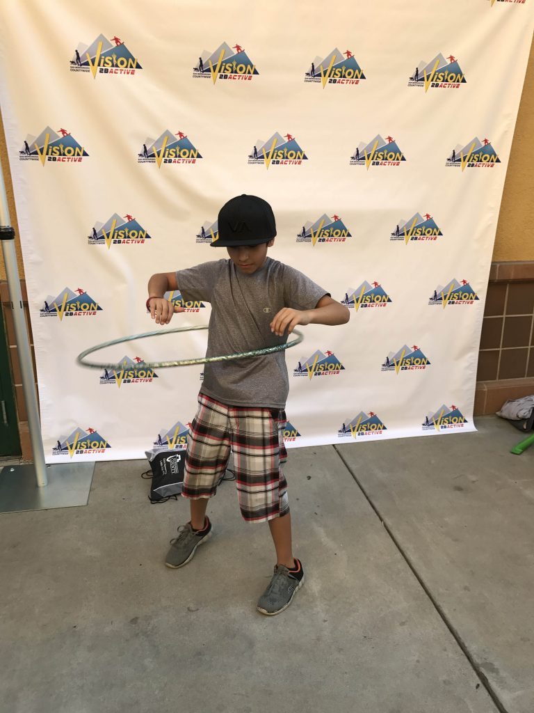 Child with hula hoop