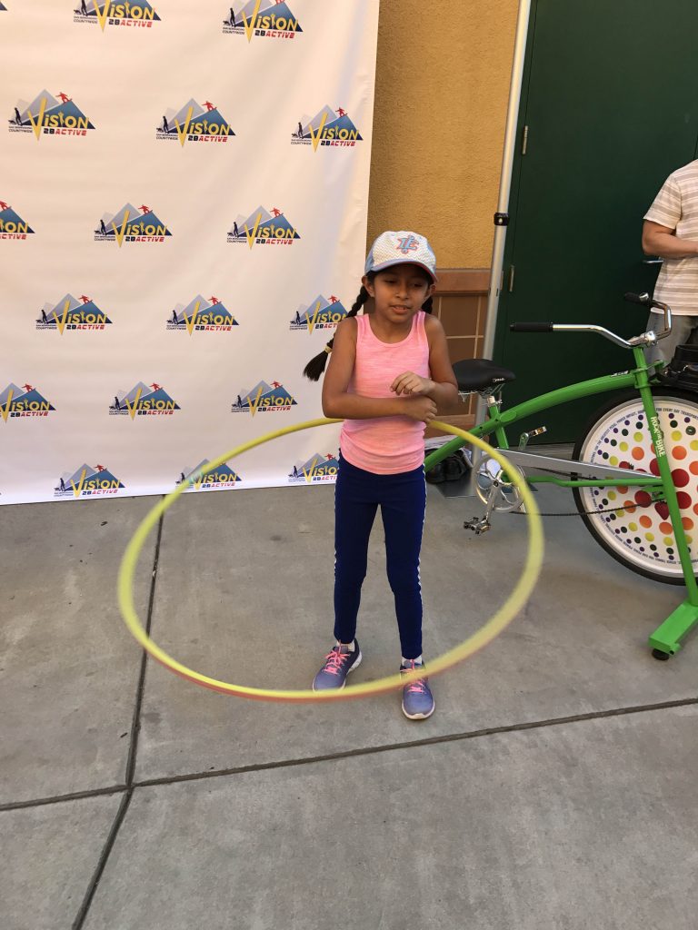 Child with hula hoop